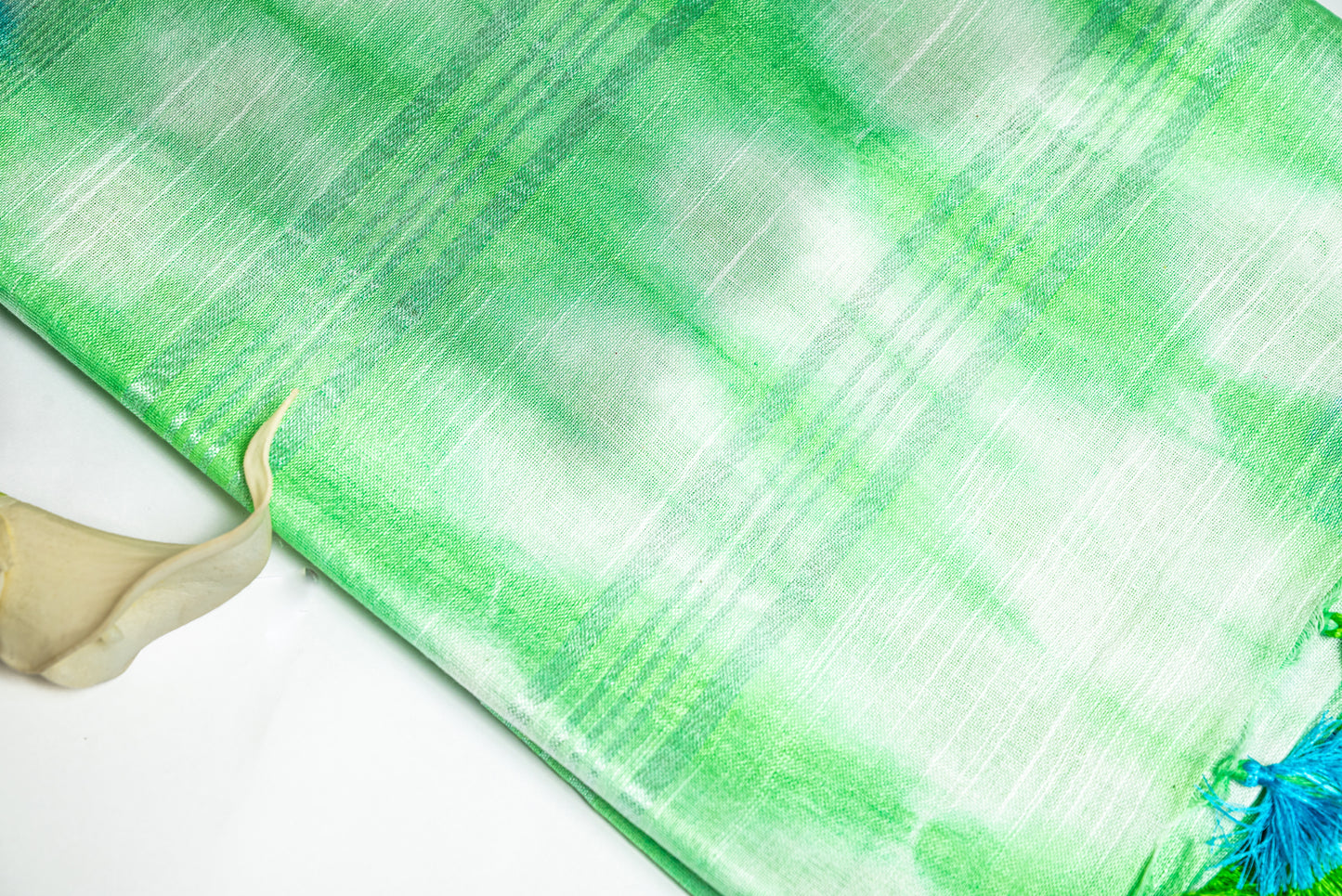 Mint Whisper -Light Green and White Linen Saree with Light Green and White Tassels