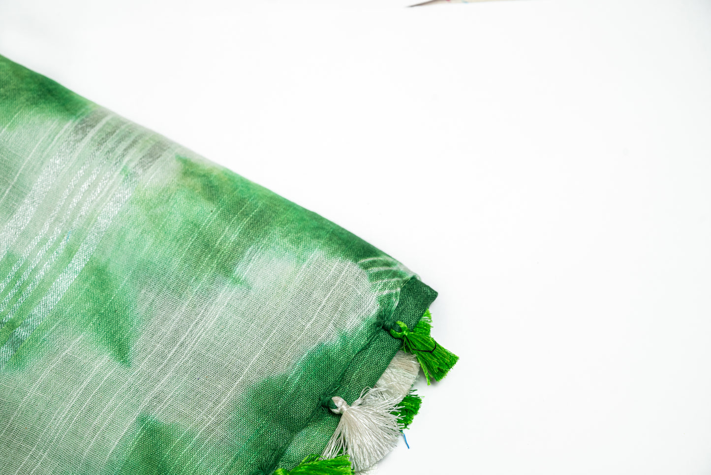 Mint Whisper -Light Green and White Linen Saree with Light Green and White Tassels