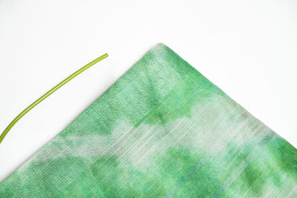 Mint Whisper -Light Green and White Linen Saree with Light Green and White Tassels